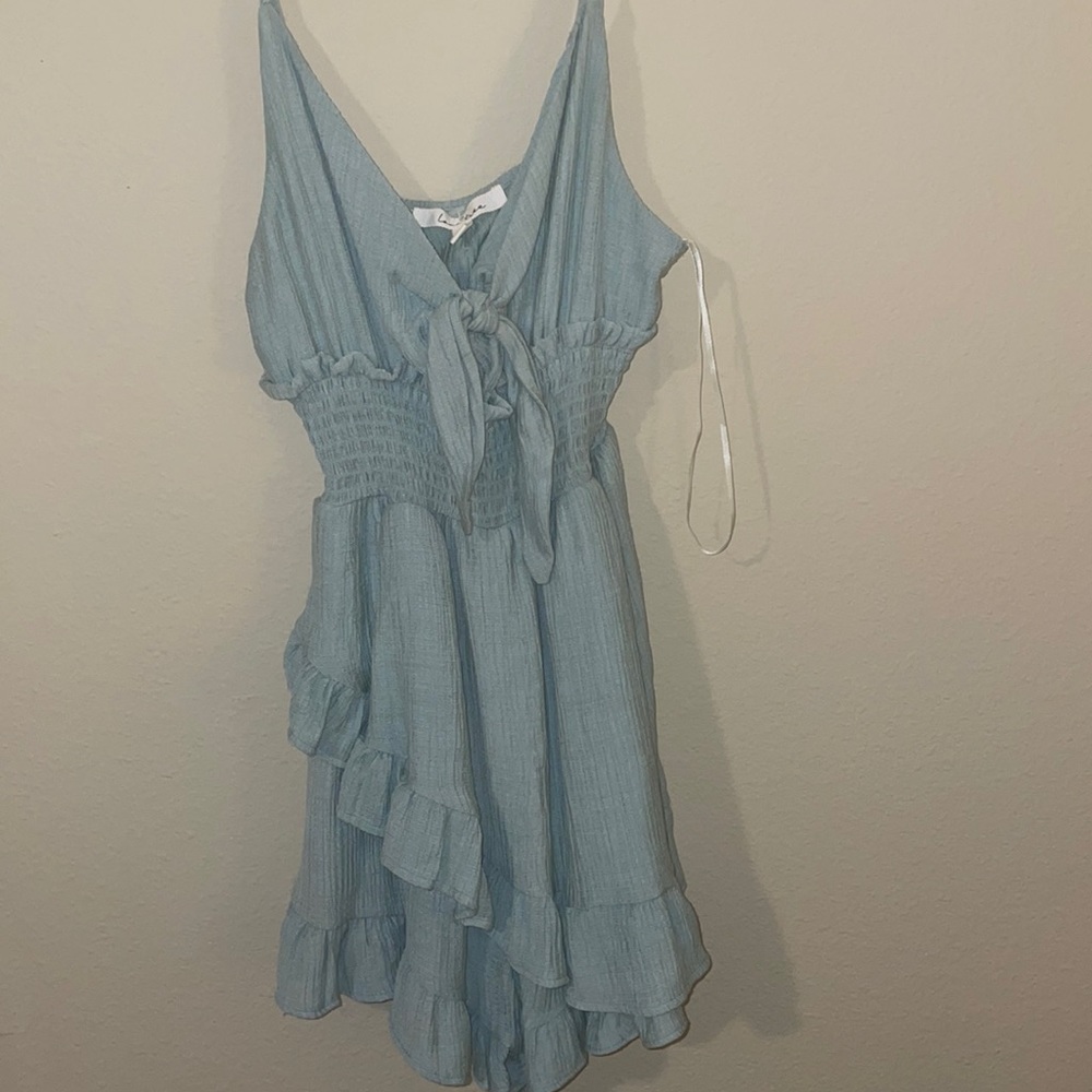 Dusty blue ruffled romper
